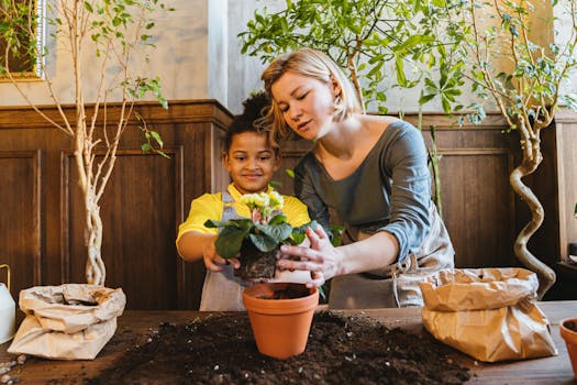 Children planting a garden together