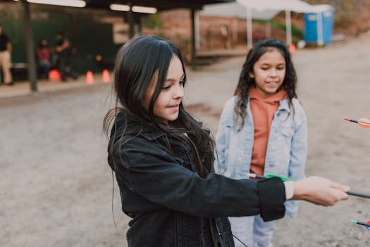 children playing a nature scavenger hunt