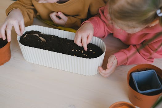 family preparing soil in the garden