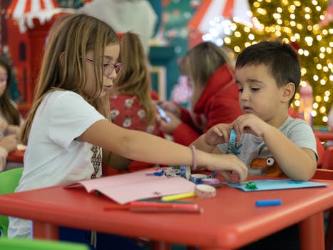 children creating sunflower crafts