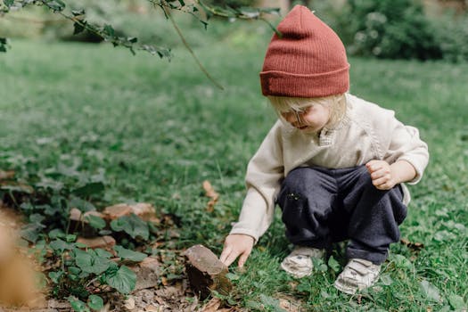 children observing garden wildlife