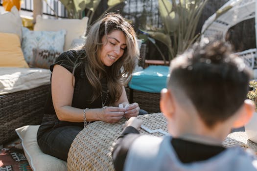 family drawing together in the garden