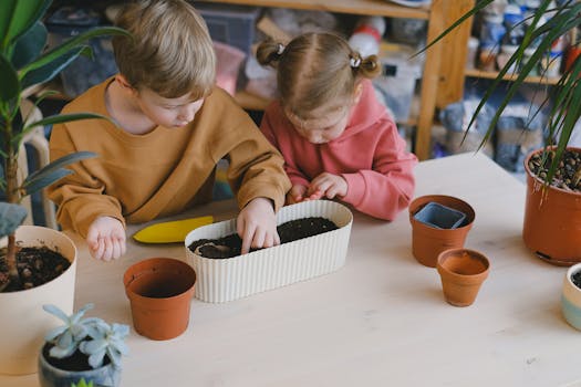 children planting flowers together