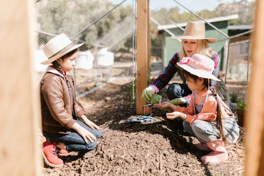 family planting seeds in a community garden